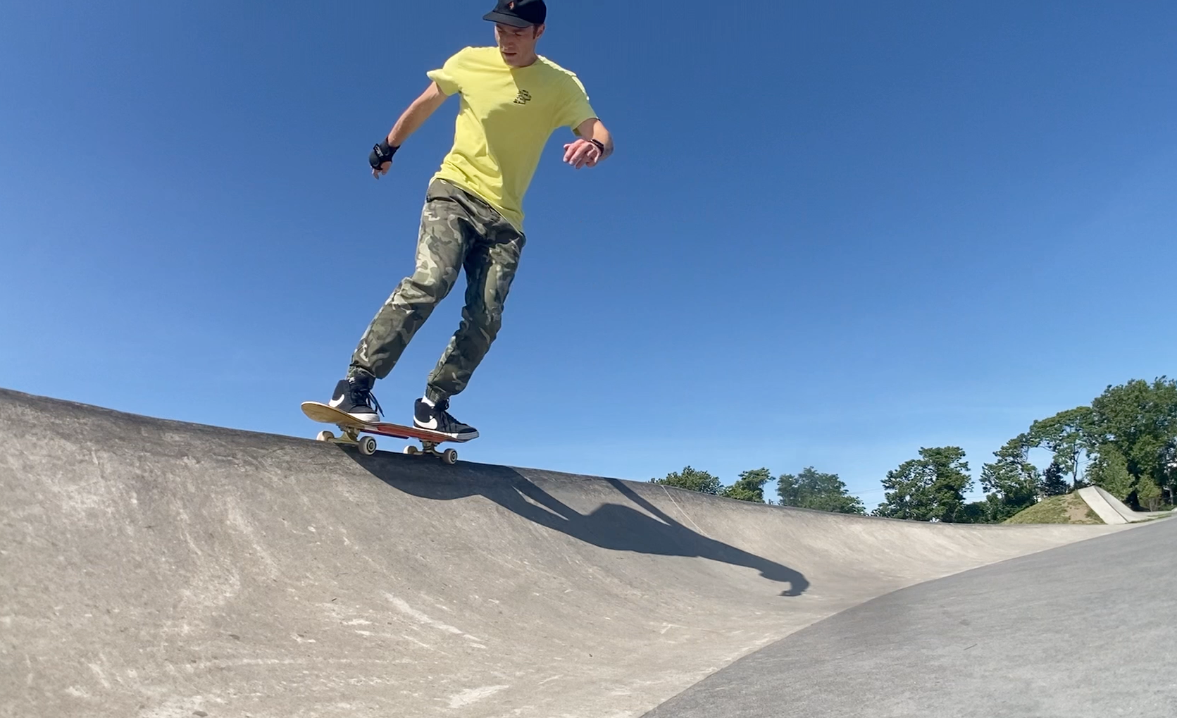 Backside 50/50 grind on that small quarter